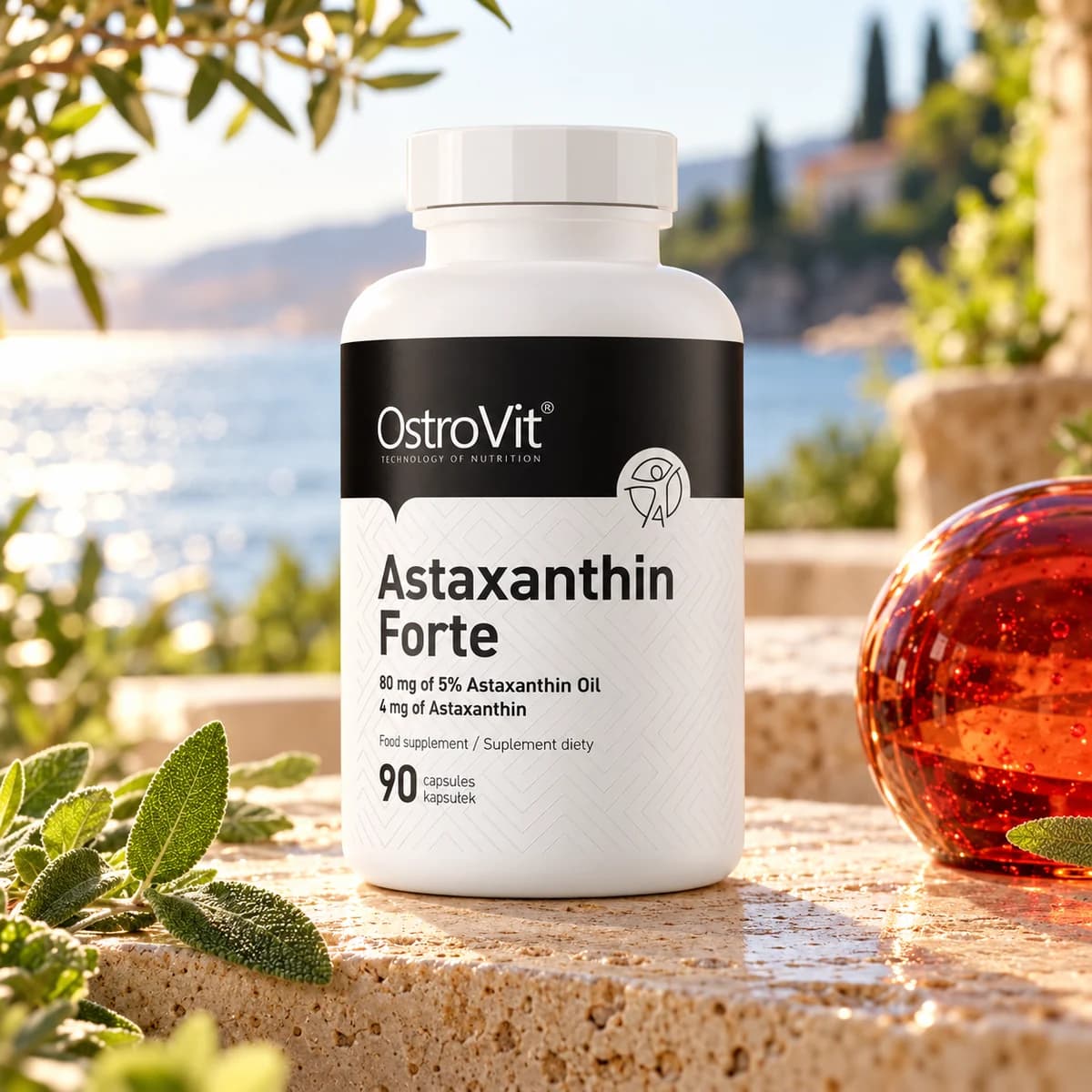 Astaxantină OstroVit Forte 4 mg, 90 capsule — flacon pe piatră, lângă apă și plante